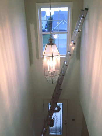 Painting a vaulted ceiling.